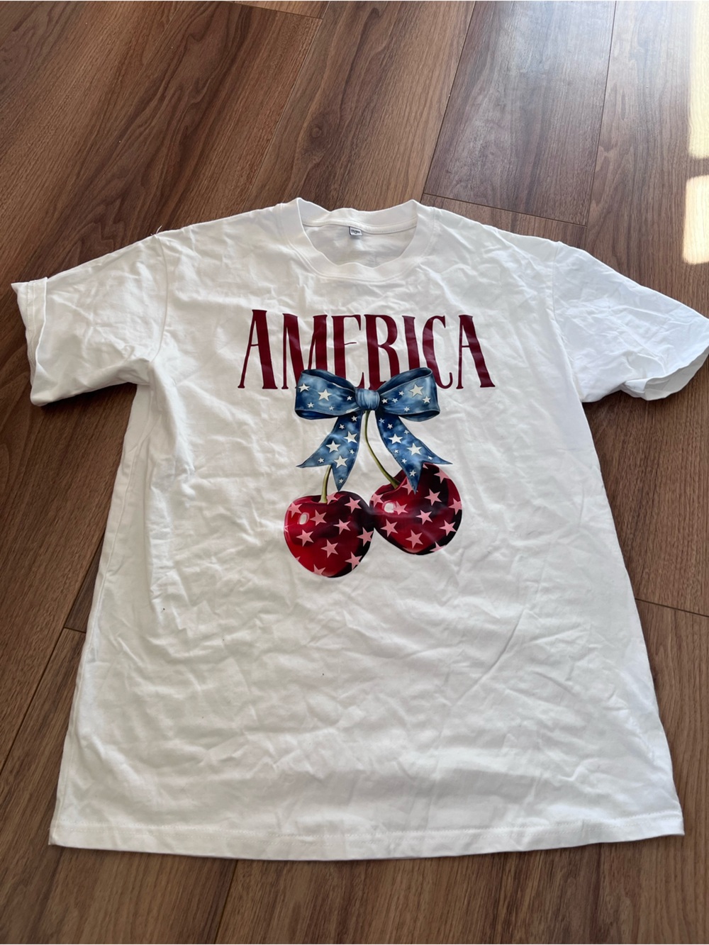 America Graphic Long Sleeve Tee in White with Patriotic Cherry Print